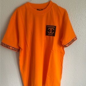 CHANEL Orange Short Sleeve Tee with Black Logo Patch